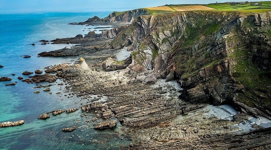 Rocky Atlantic cliffs and tidal shore near Hartland Quay